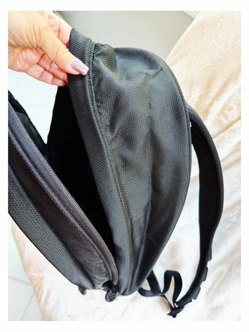 Tumi Black Backpack for Men or Women with Red Logo Accent